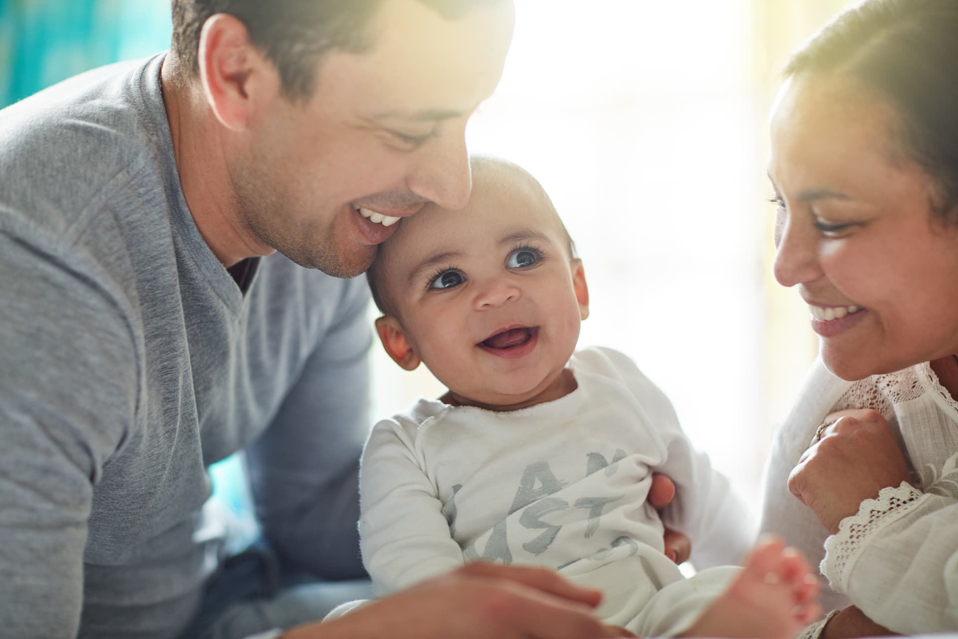 Happy family playing together at home